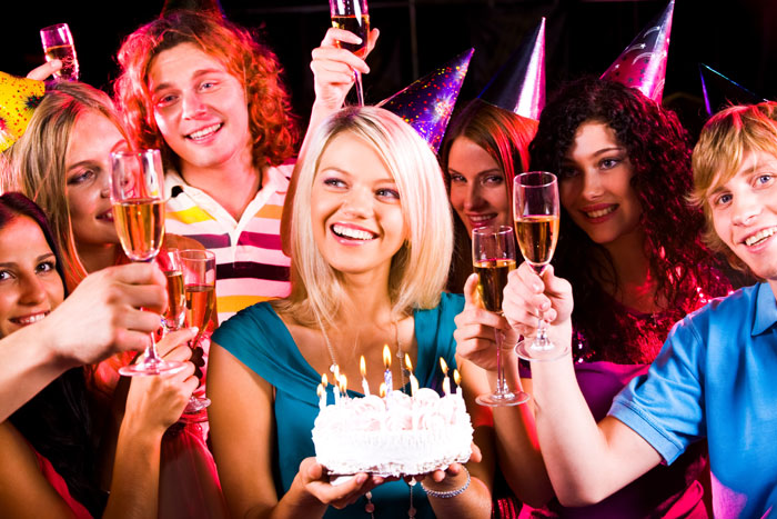 People celebrating an adults birthday