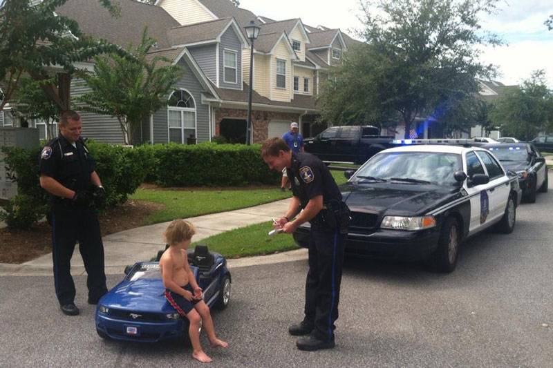 Funny Police Giving Ticket to Child for Speeding